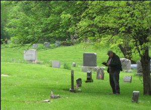 Man standing in Oakwood Cemetery